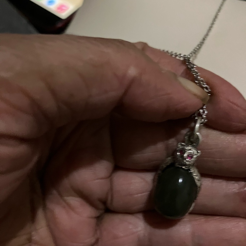 Antique fabrege jade and silver pendent fully hallmarked .